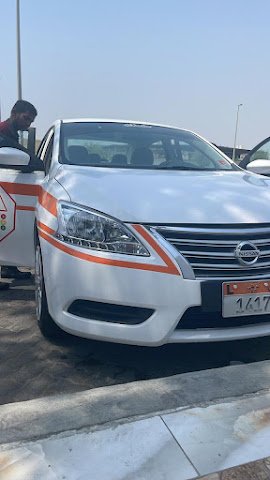 Sallo Bai and Waseem King driveing lisense shop
